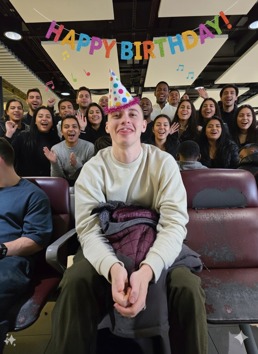 Photo of a young man in a party hat